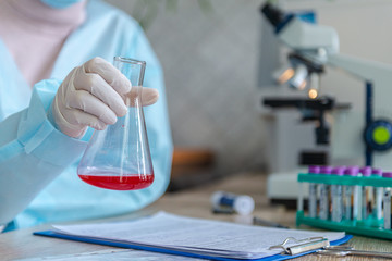 A doctor is looking for a coronavirus vaccine in his laboratory.