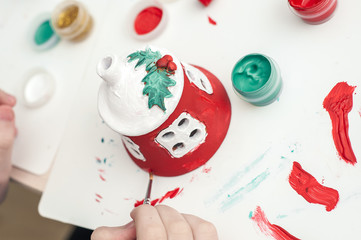 Clay house do it yourself. We paint with acrylic paints. Crafting.
