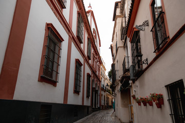 Fototapeta na wymiar Narrow street in Seville, Spain