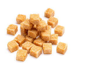 brown refined sugar on a white background