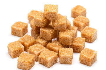 brown refined sugar on a white background