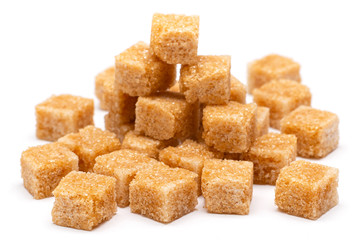 brown refined sugar on a white background