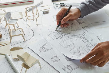 Designer sketching drawing design development product plan draft chair armchair Wingback Interior...