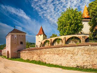 Naklejka premium Stunning view of defensive walls and towers of Lutheran fortified church in Biertan, Transylvania, Romania