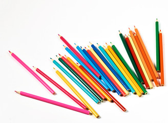 Color pencils lying on a white background.