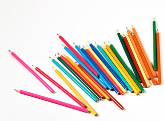 Fototapeta premium Color pencils lying on a white background.