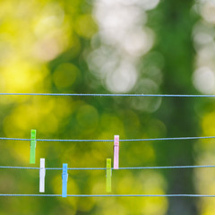 Clothes pegs on washing line, close-up, Sweden, Europe
