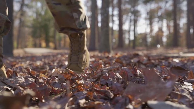 Female Amy Soldier Walking in The Forest, Close up, Slow Motion