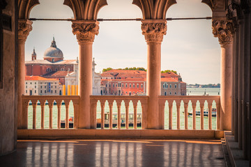 First floor arcade and balcony of the Doge Palace or Palazzo Ducale with a view on the lagoon in...