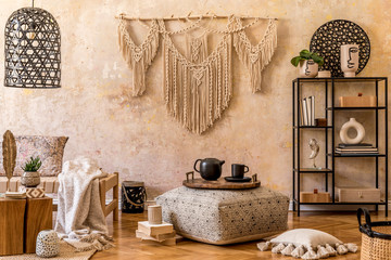 Interior design of stylish living room with chaise longue, beautiful macrame, rattan decoration,...