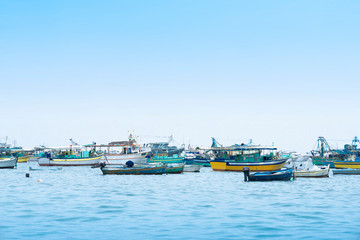 Fishing Boats Under Blue Sky