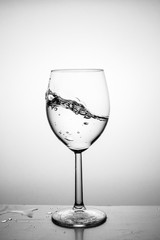 Glass with water up and splash