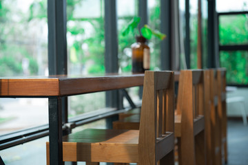 Obraz na płótnie Canvas wood chairs in the restaurant 