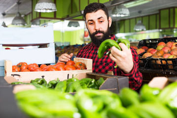 assistant demonstrating peppers
