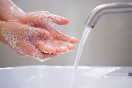 Wash your hands with soap, prevent virus and bacteria in the tap with running water. Good hygiene before eating or handling public items