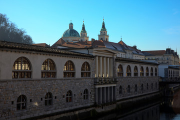 Lubiana / Slovenia - December 8, 2017: A building near a river in Lubiana town, Slovenia