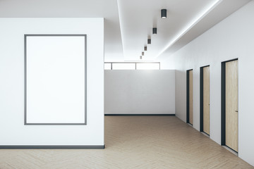 Hall interior with blank poster on wall and three doors.