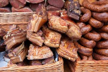 Smoked Lithuanian delicacies displayed at the street market