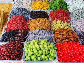 Sweets and berries in thai market