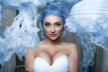 Beautiful female with blue hair and jellyfish © Alexei