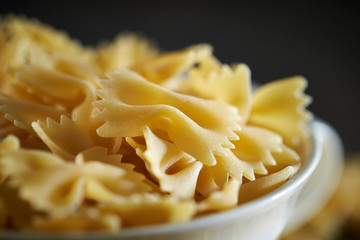 Dried farfalle pasta in cup