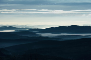 Obraz premium fog and hills, minimal morning landscape