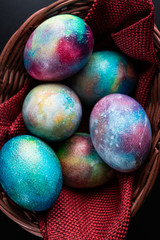Mystical coloring eggs in the basket
