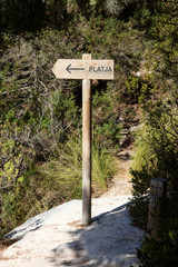 Macarelleta, Menorca / Spain - June 25, 2016: Cala Macarelleta wooden sign, Menorca, Balearic Islands, Spain