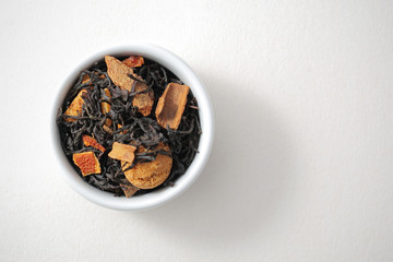 Black tea with the addition of cinnamon bark, almonds and cookies.