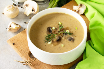 Vegan and diet healthy food. Mushroom soup puree with cream, champignons and vegetables.