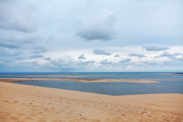 scenery with islet and sandy beach