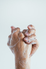 Woman washing her hands. Close up