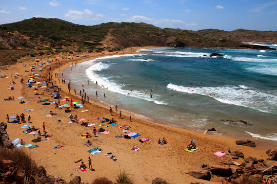 Cape Cavalleria, Menorca / Spain - June 23, 2016: The beach of Platja de Cavalleria, Menorca, Balearic Islands, Spain