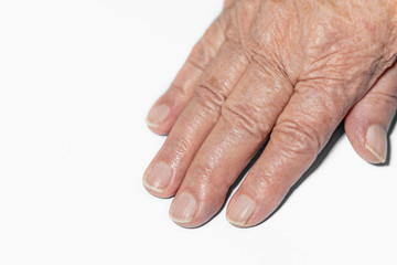 Hand of an old woman on a white background, hand of a grandmother close-up