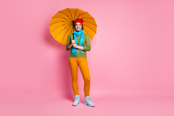 Full size photo of cheerful lovely cute pretty girl enjoy rainstorm travel holiday hold bright...