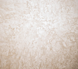 Abstract grunge background. Vintage wall texture. Beige light warm trani marble stone natural surface for bathroom or kitchen countertop. High resolution photo.