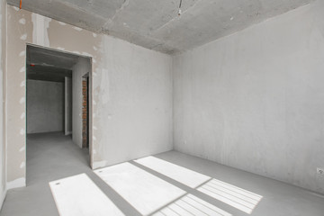 interior of the apartment without decoration in gray colors