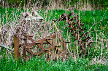 old and rusty agricultural devices