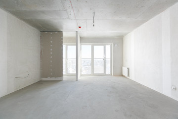 interior of the apartment without decoration in gray colors