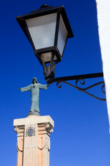 Fototapeta na wymiar El Toro, Menorca / Spain - June 25, 2016: A christ statue at summit of Mount Toro (El Toro), Es Mercadal, Menorca, Balearic Islands, Spain