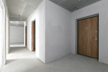 interior of the apartment without decoration in gray colors