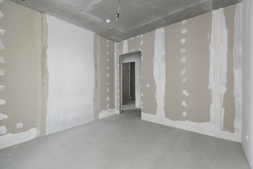 interior of the apartment without decoration in gray colors