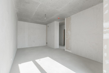 Fototapeta premium interior of the apartment without decoration in gray colors
