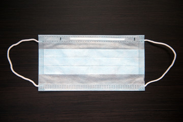 Antiviral medical mask close up, personal protective equipment