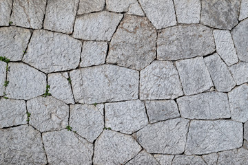 19th-century polygonal masonry of grey limestone