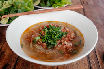 Luang Prabang Khao Soi, traditional rice spicy noodle with minced pock and coriander in Laos.