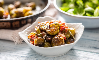 Fried brussels sprout with roasted bacon and parmesan cheese