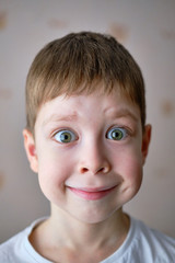 portrait of a boy with a surprised face