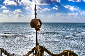 Human skull over spear as the decoration on the deck.