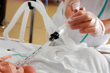 Nurse hands operating patient in hospital